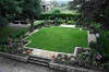 Sandstone borders provide shape and a 1st class edge to formal beds